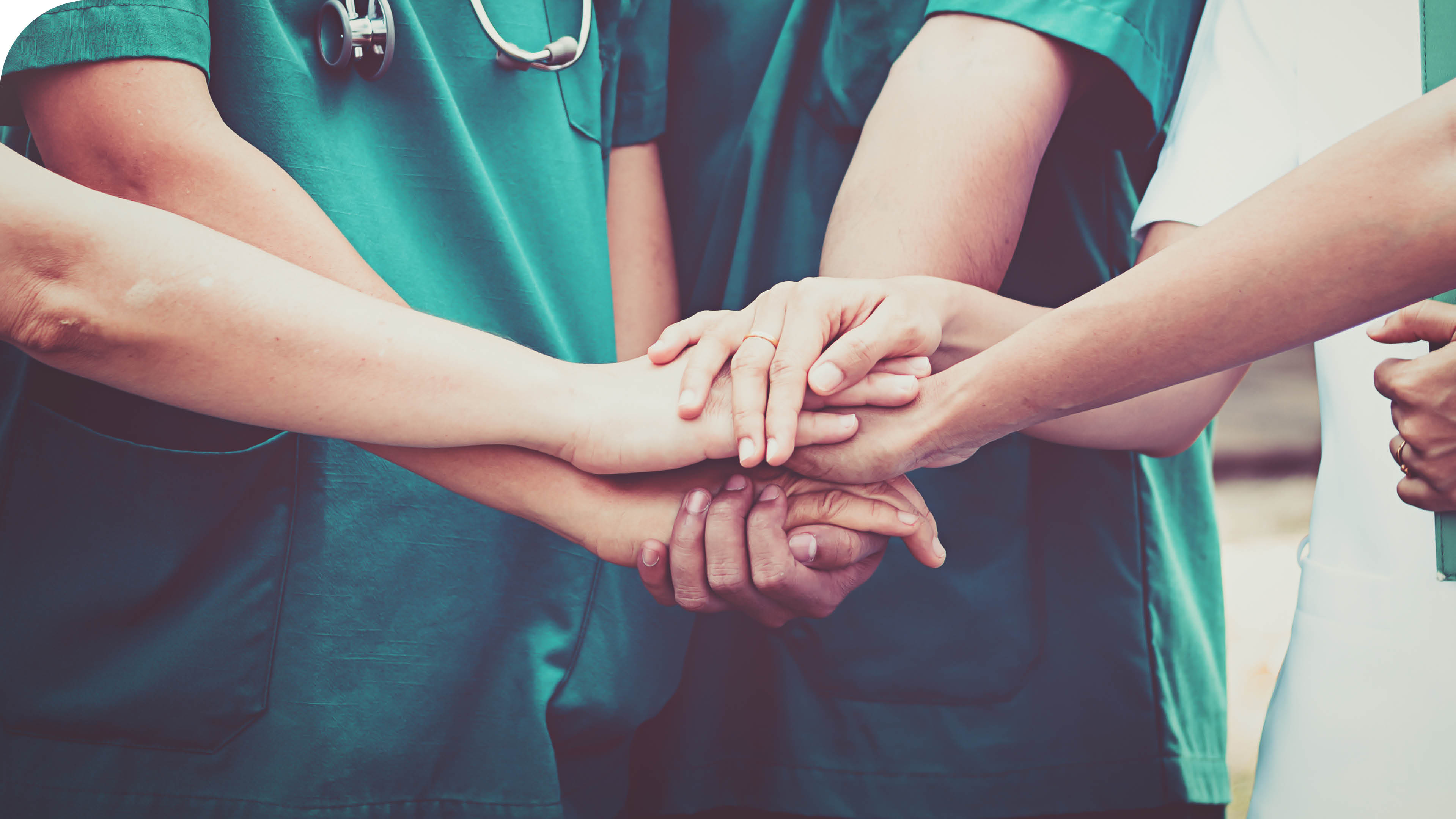 Doctors and nurses coordinate hands. Concept Teamwork